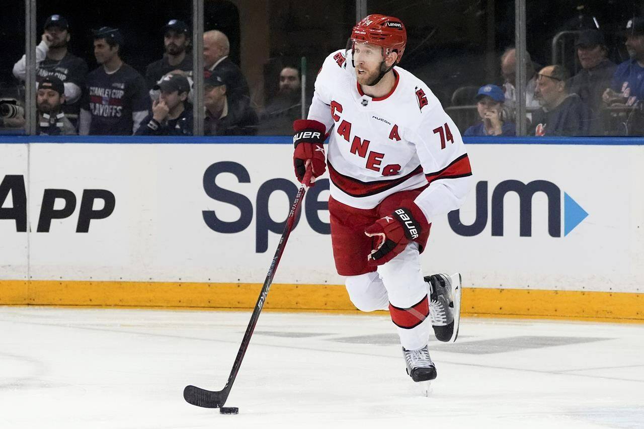 Carolina Hurricanes defenseman Jaccob Slavin (74) skates with the puck during Game 1 of an NHL hockey Stanley Cup second-round playoff series against the New York Rangers, Sunday, May 5, 2024, in New York. Slavin has has won the NHL’s Lady Byng Trophy, the league announced Thursday. THE CANADIAN PRESS/AP, Julia Nikhinson