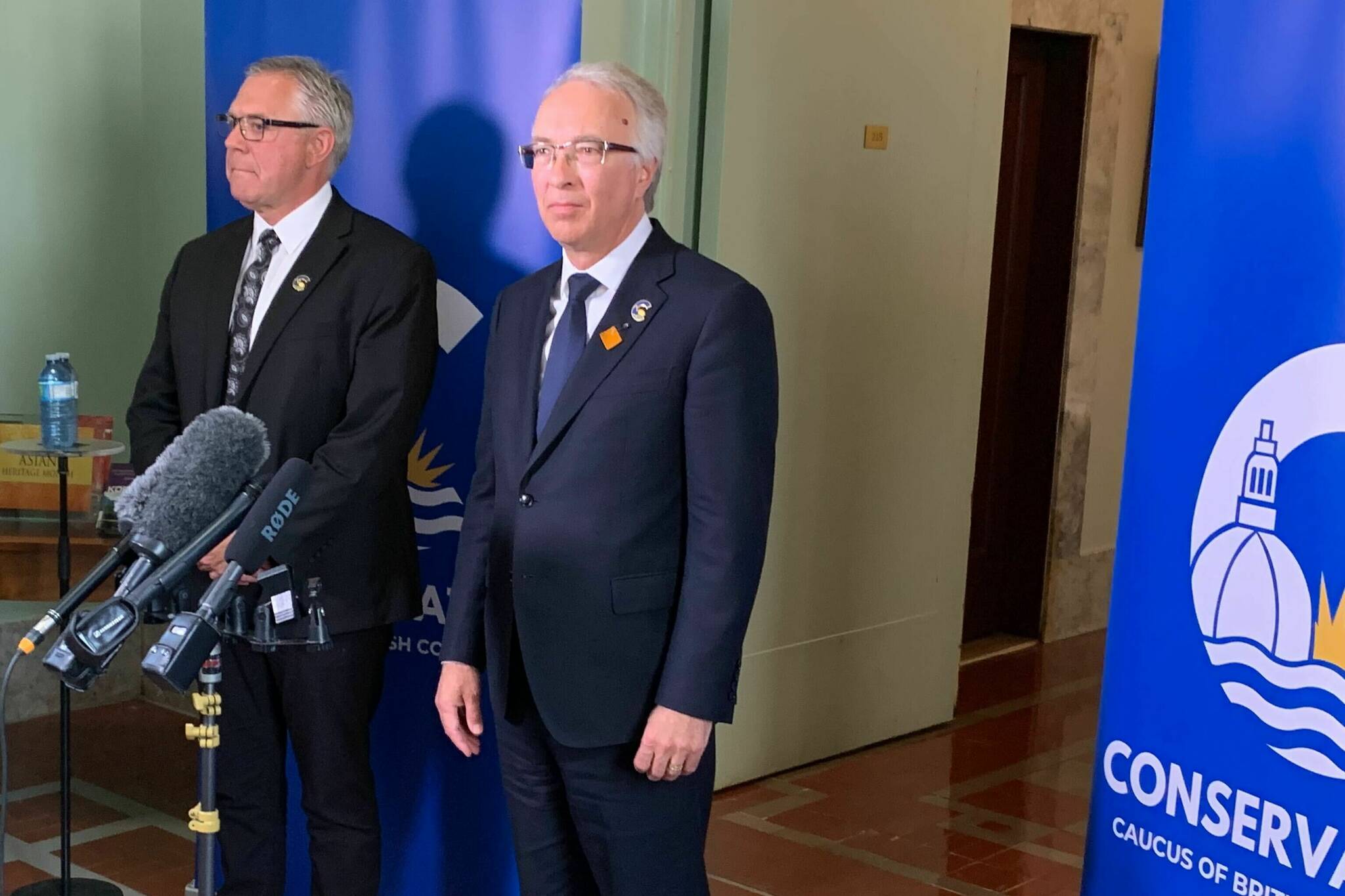 B.C. Conservative Party leader John Rustad, right, speaks to media Friday, May 31, 2024 as he announces Lorne Doerkson, MLA for Cariboo-Chilcotin, will be joining his party. (Wolfgang Depner/Black Press Media)