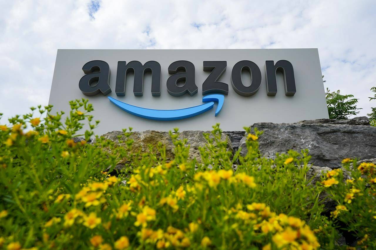 Unifor has filed an unfair labour practice complaint against Amazon amid a vote by workers at a Delta, B.C. warehouse over whether they want to join the union. Signage at an Amazon fulfilment centre is pictured in Ottawa on Monday, July 11, 2022. THE CANADIAN PRESS/Sean Kilpatrick