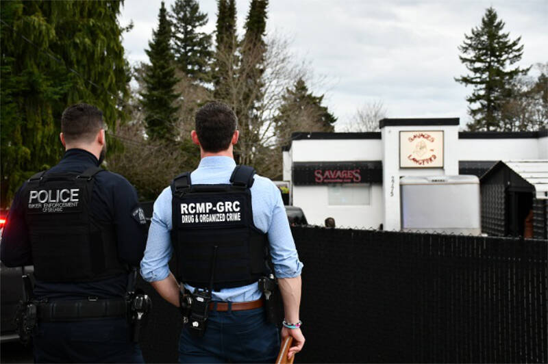 Police at the Savages Outlaw Motorcycle Gang’s Langford clubhouse on Jan. 31. (Photo courtesy RCMP)