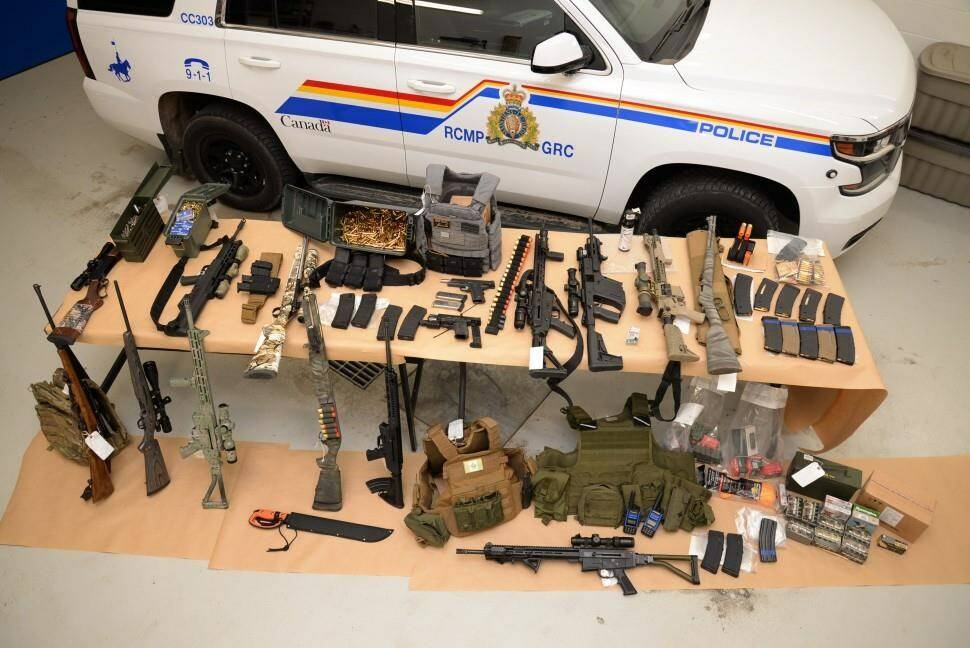 Jury selection is scheduled for two men charged with conspiracy to commit murder at a 2022 border protest at Coutts, Alta. Weapons and ammunition seized by the RCMP are shown in a 2022 handout photo. THE CANADIAN PRESS/HO - RCMP, *MANDATORY CREDIT*