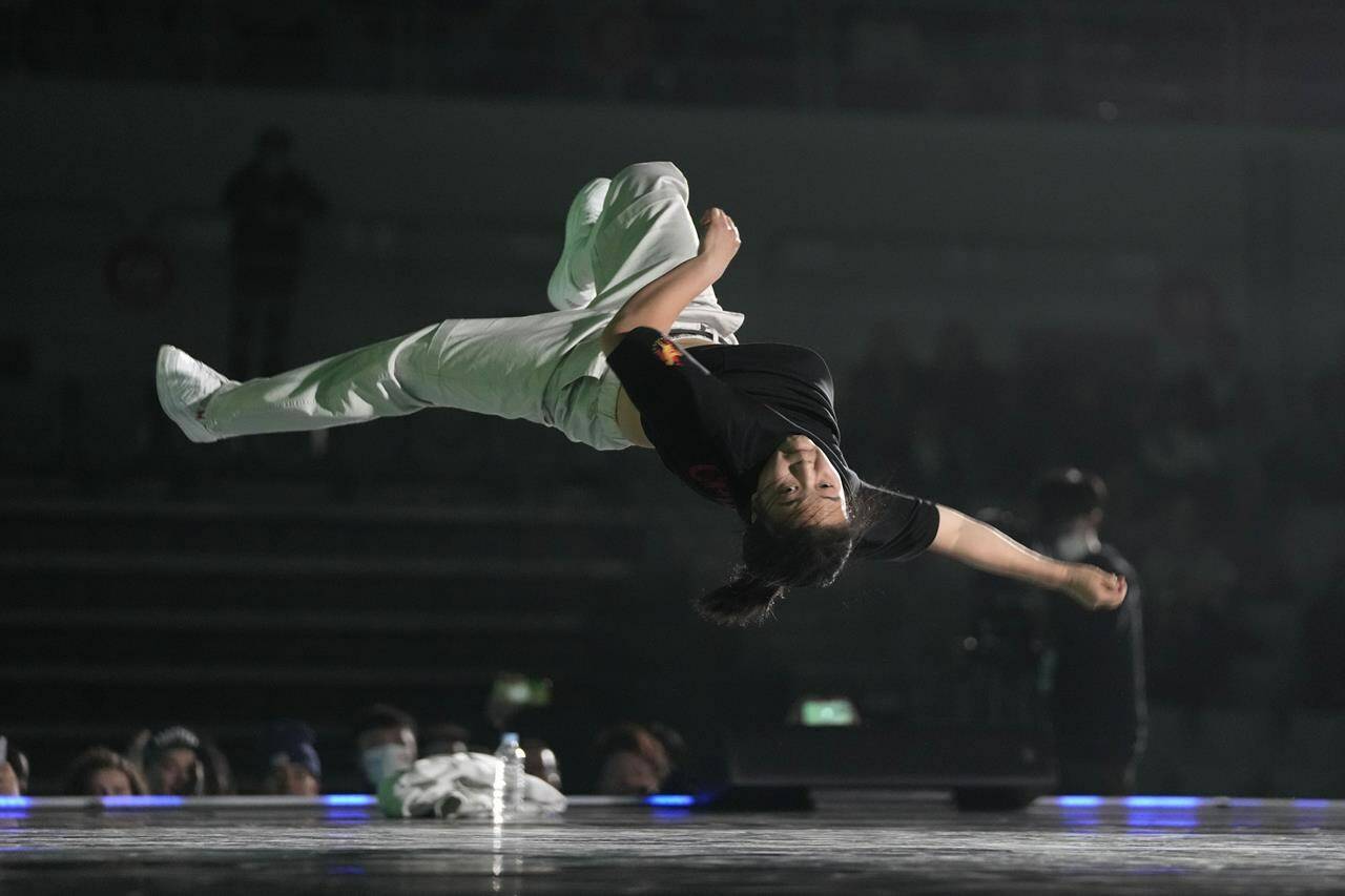 FILE - Liu Qingyi of China, known as B-girl 671, competes against Ami Yuasa of Japan, known as B-girl Ami during the final event of the 2022 World Breaking Championship in Seoul, South Korea, Saturday, Oct. 22, 2022. Breakdancing will make its debut as an Olympic sport at the 2024 Paris Olympics. (AP Photo/Lee Jin-man, File)