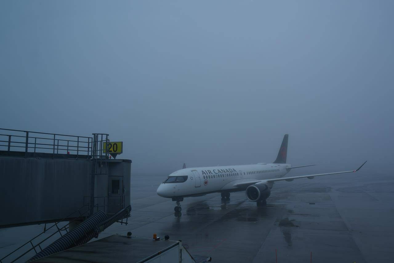 The union representing Air Canada pilots says it plans to ask that a federal conciliator be assigned to assist in contract negotiations with the airline. An Air Canada plane taxis towards the gate in poor weather conditions at Halifax Airport, in Halifax, Wednesday, March 27, 2024. THE CANADIAN PRESS/Chris Young