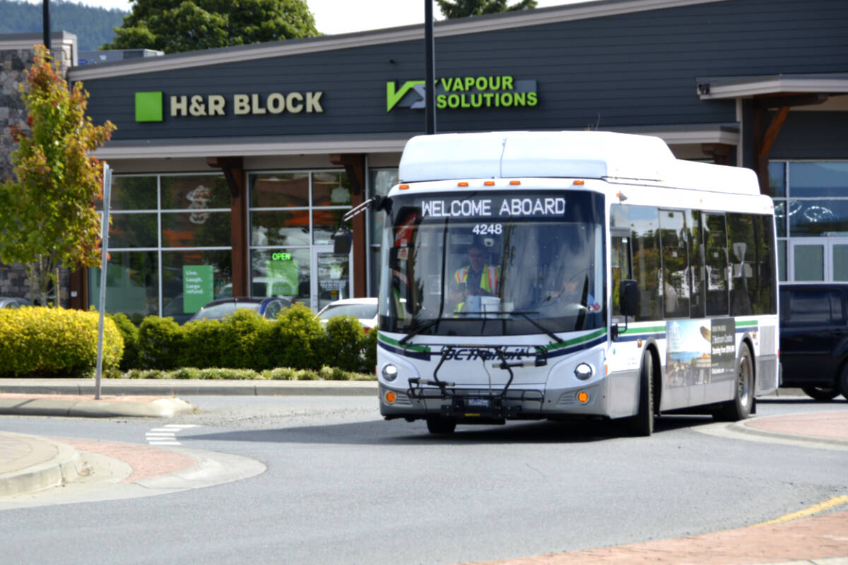 A B.C. Transit bus makes its way around a Highway 14 roundabout in Sooke. (Kevin Laird - Sooke News Mirror)