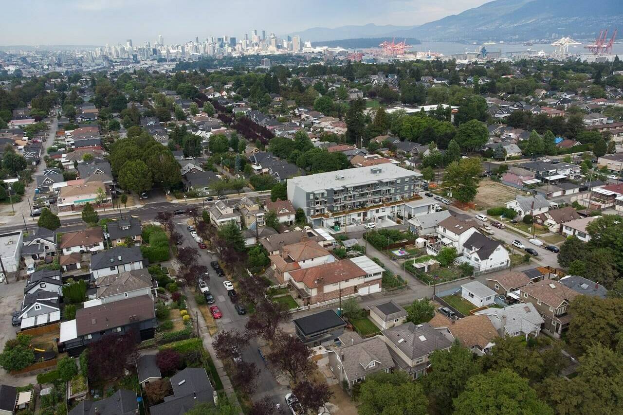 Houses are shown in Vancouver, B.C., Friday, Aug. 19, 2022. THE CANADIAN PRESS/Darryl Dyck