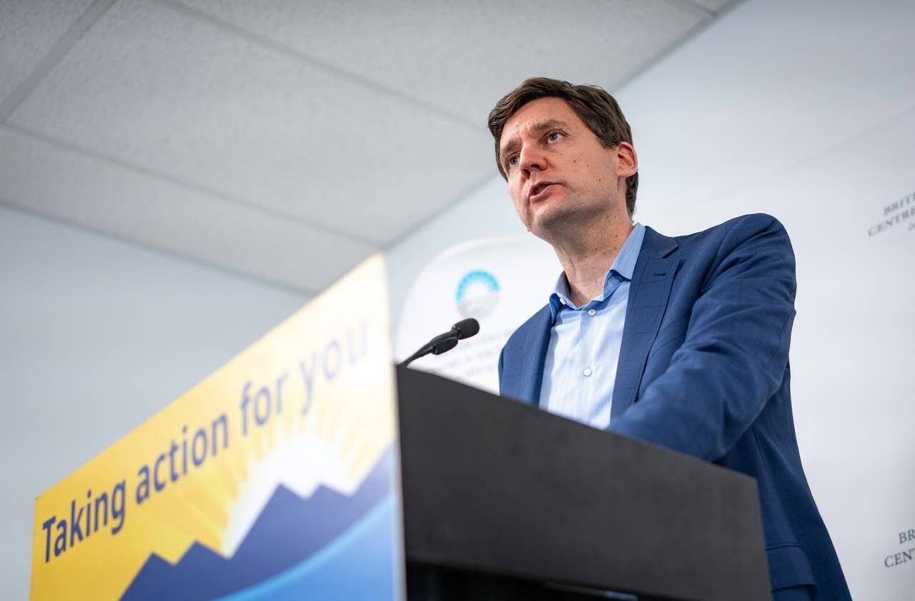 B.C. Premier David Eby speaks during a news conference about improving access to mental-health and addiction care for people in the Downtown Eastside in Vancouver, on Friday, May 31, 2024. British Columbia has announced the appointment of a chief scientific adviser to address a “growing population” of people who survived an overdose but were left with life-altering brain injuries. THE CANADIAN PRESS/Ethan Cairns