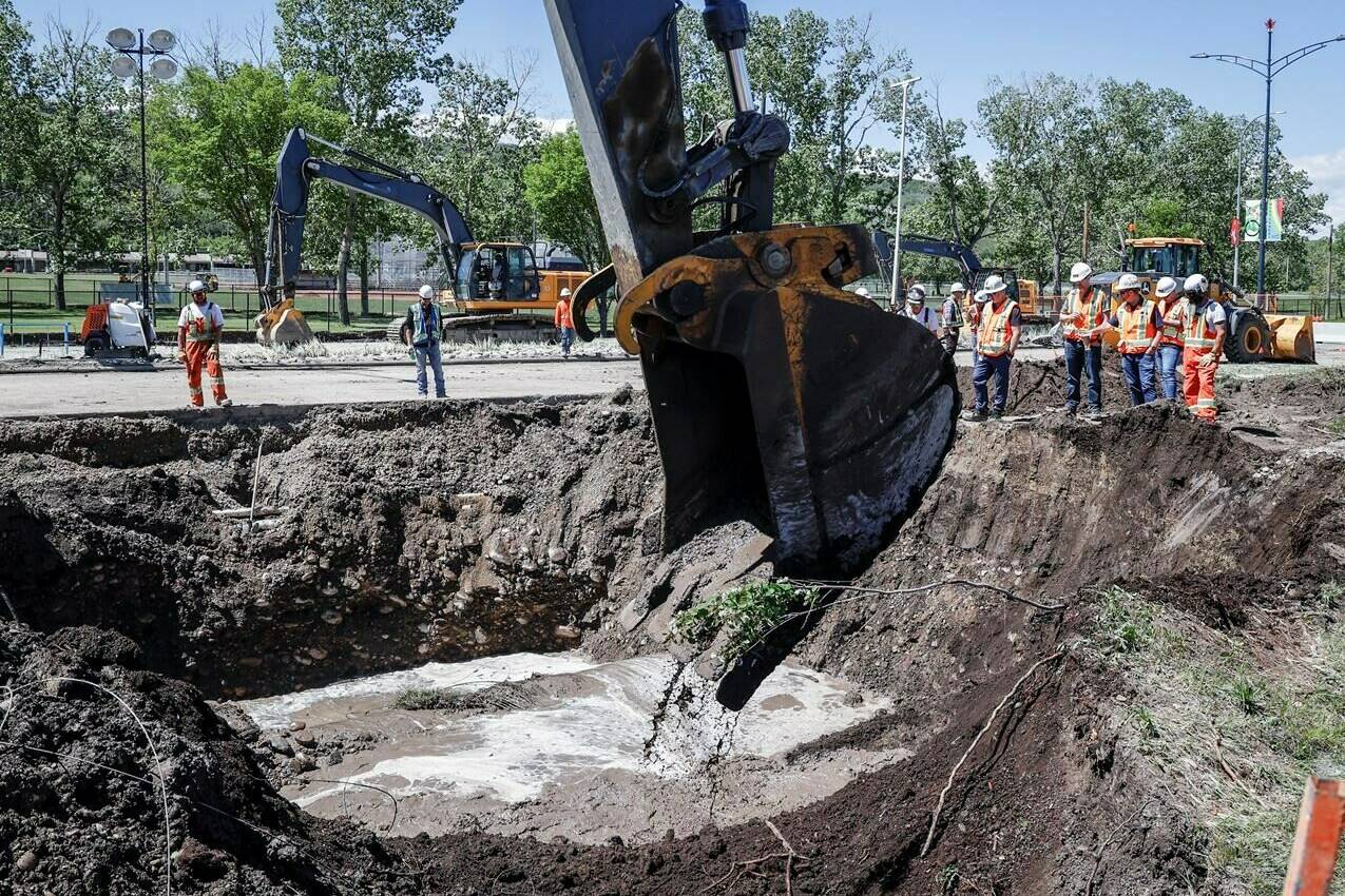 Calgarians are being urged to keep reducing their water use as work to repair a major water main entered a second day in Calgary, Friday, June 7, 2024.THE CANADIAN PRESS/Jeff McIntosh