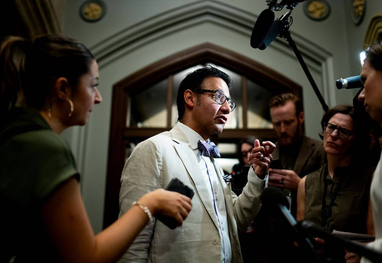 Arif Virani, Minister of Justice and Attorney General speaks to reporters prior to a cabinet meeting on Parliament Hill in Ottawa, on Tuesday, June 4, 2024. Canada’s justice minister says he’s open to amending the government’s long-awaited legislation aimed at protecting Canadians against online harms, while the Opposition Conservatives say the Liberals could instead move faster by modernizing existing laws. THE CANADIAN PRESS/Spencer Colby