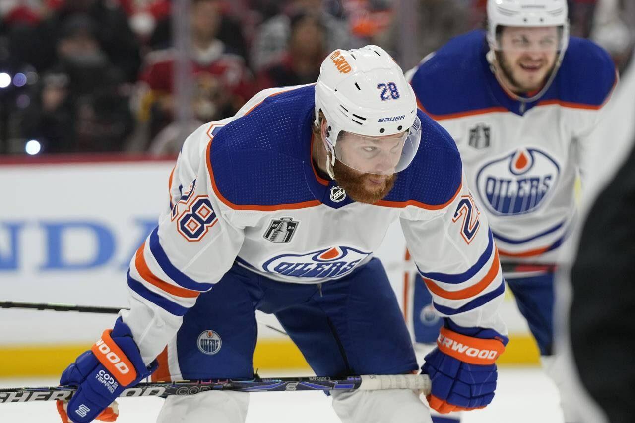 Edmonton Oilers right wing Connor Brown (28) waits for the puck during the second period of Game 2 of the NHL hockey Stanley Cup Finals against the Florida Panthers, Monday, June 10, 2024, in Sunrise, Fla. (AP Photo/Wilfredo Lee)