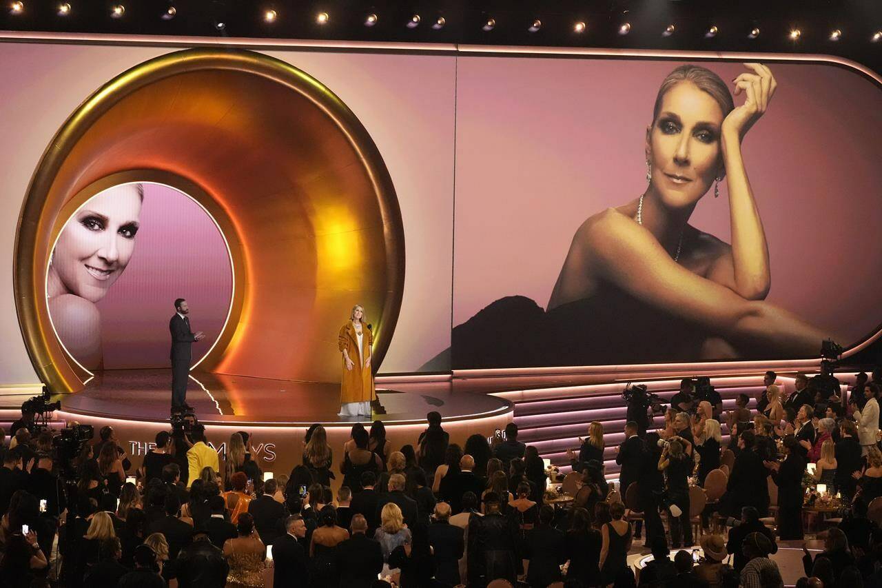 Celine Dion says she “did not take the time” to figure out her rare neurological disorder and that the burden of lying about her condition became “too much.” Dion presents the award for album of the year during the 66th annual Grammy Awards on Sunday, Feb. 4, 2024, in Los Angeles. THE CANADIAN PRESS/AP-Chris Pizzello