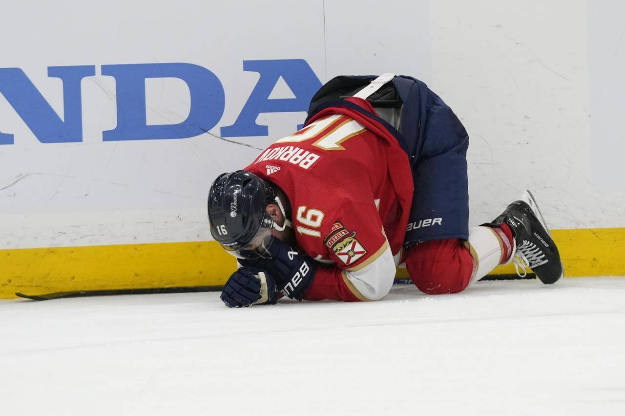 Florida Panthers centre Aleksander Barkov (16) kneels on the ice after he was injured during the third period of Game 2 of the NHL hockey Stanley Cup Finals against the Edmonton Oilers on June 10, 2024, in Sunrise, Fla. THE CANADIAN PRESS/AP, Wilfredo Lee