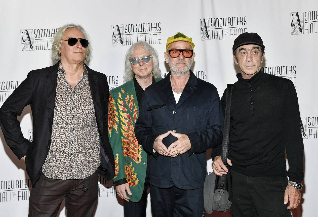 R.E.M. band members, from left, Peter Buck, Mike Mills, Michael Stipe and Bill Berry attend the Songwriters Hall of Fame Induction and Awards Gala at the New York Marriott Marquis Hotel on Thursday, June 13, 2024, in New York. (Photo by Evan Agostini/Invision/AP)