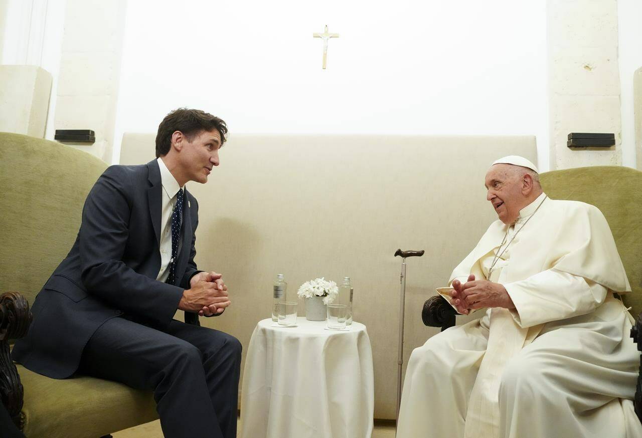 Prime Minister Justin Trudeau, left, meets with Pope Francis during the G7 Summit in Savelletri Di Fasano, Italy on Friday, June 14, 2024. THE CANADIAN PRESS/Sean Kilpatrick