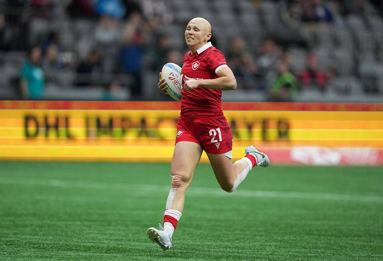 Canada’s Olivia Apps scores a try against Brazil during HSBC Canada Sevens women’s rugby action, in Vancouver, B.C., on March 4, 2023. THE CANADIAN PRESS/Darryl Dyck