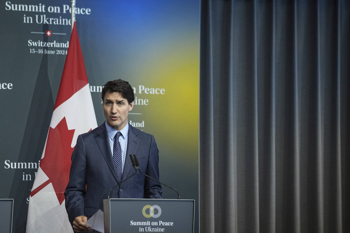 Canada Prime Minister Justin Trudeau speaks during the closing press conference of the Ukraine peace summit in Obbürgen, Switzerland, Sunday, June 16, 2024. Switzerland is hosting scores of world leaders this weekend to try to map out the first steps toward peace in Ukraine. (AP Photo/Laurent Cipriani)