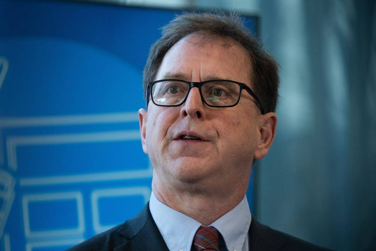 Minister of Health Adrian Dix speaks during a news conference to announce Canada’s first self-screening cervical cancer plan, with at-home tests in Vancouver, B.C., on January 9, 2024. THE CANADIAN PRESS/Ethan Cairns