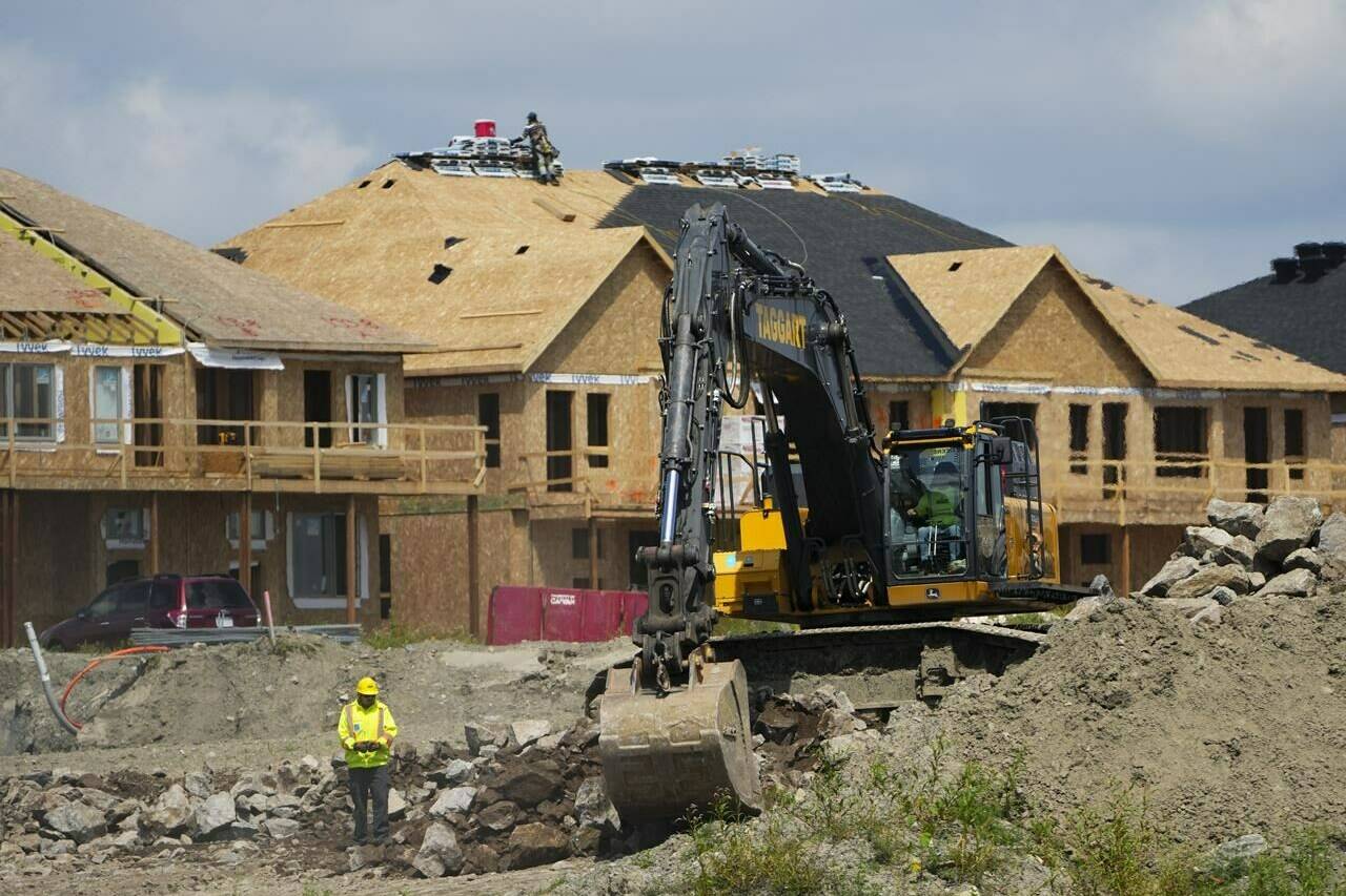 Canada Mortgage and Housing Corp. says the annual pace of housing starts in May climbed 10 per cent compared with April, helped by gains in Montreal and Toronto. New homes are built in Ottawa on Monday, Aug. 14, 2023. THE CANADIAN PRESS/Sean Kilpatrick