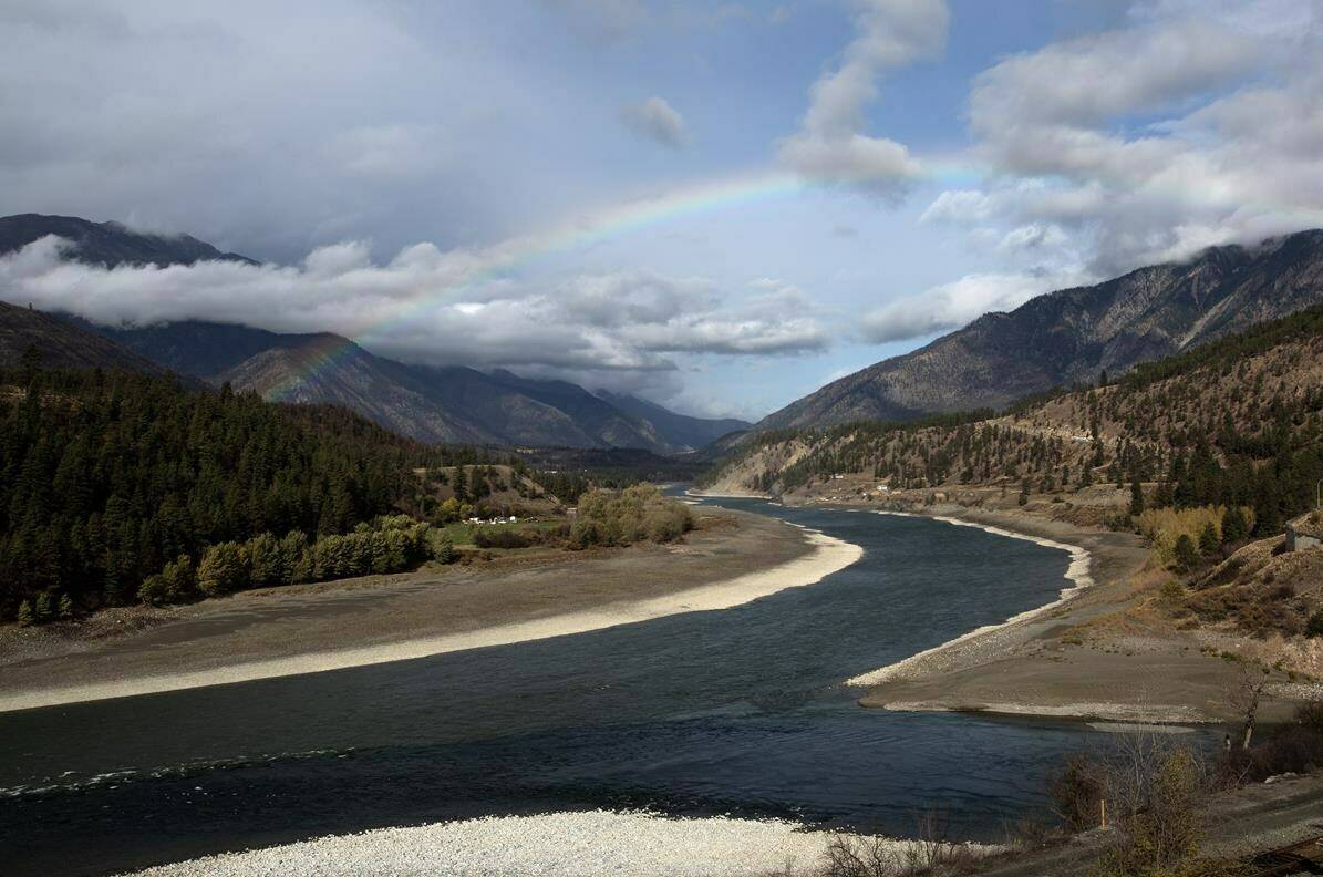 Environment Canada says an unseasonable cool air mass over southern B.C. has broken minimum temperature records, including one dating back about 70 years. A rainbow can been seen over where the Fraser and Thompson rivers meet in Lytton, B.C., Wednesday, Oct. 18, 2023. THE CANADIAN PRESS/Marissa Tiel