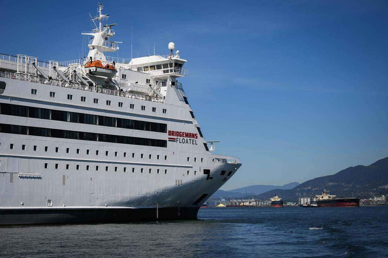A renovated cruise ship known as a “floatel” is seen at anchor in the harbour in Vancouver, on Thursday, May 9, 2024. THE CANADIAN PRESS/Darryl Dyck