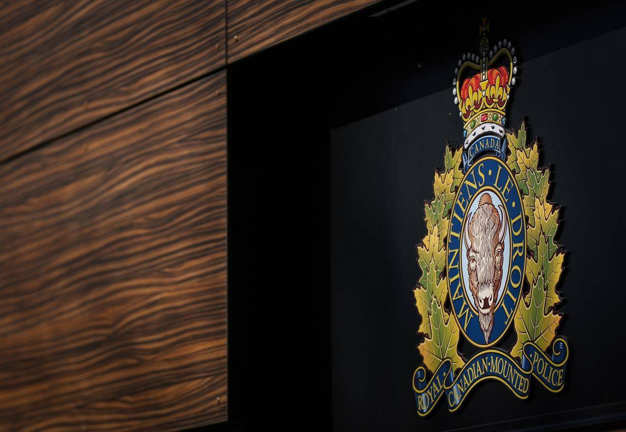 The RCMP logo is seen outside the force’s ‘E’ division headquarters in Surrey, B.C., on Thursday, March 16, 2023. THE CANADIAN PRESS/Darryl Dyck