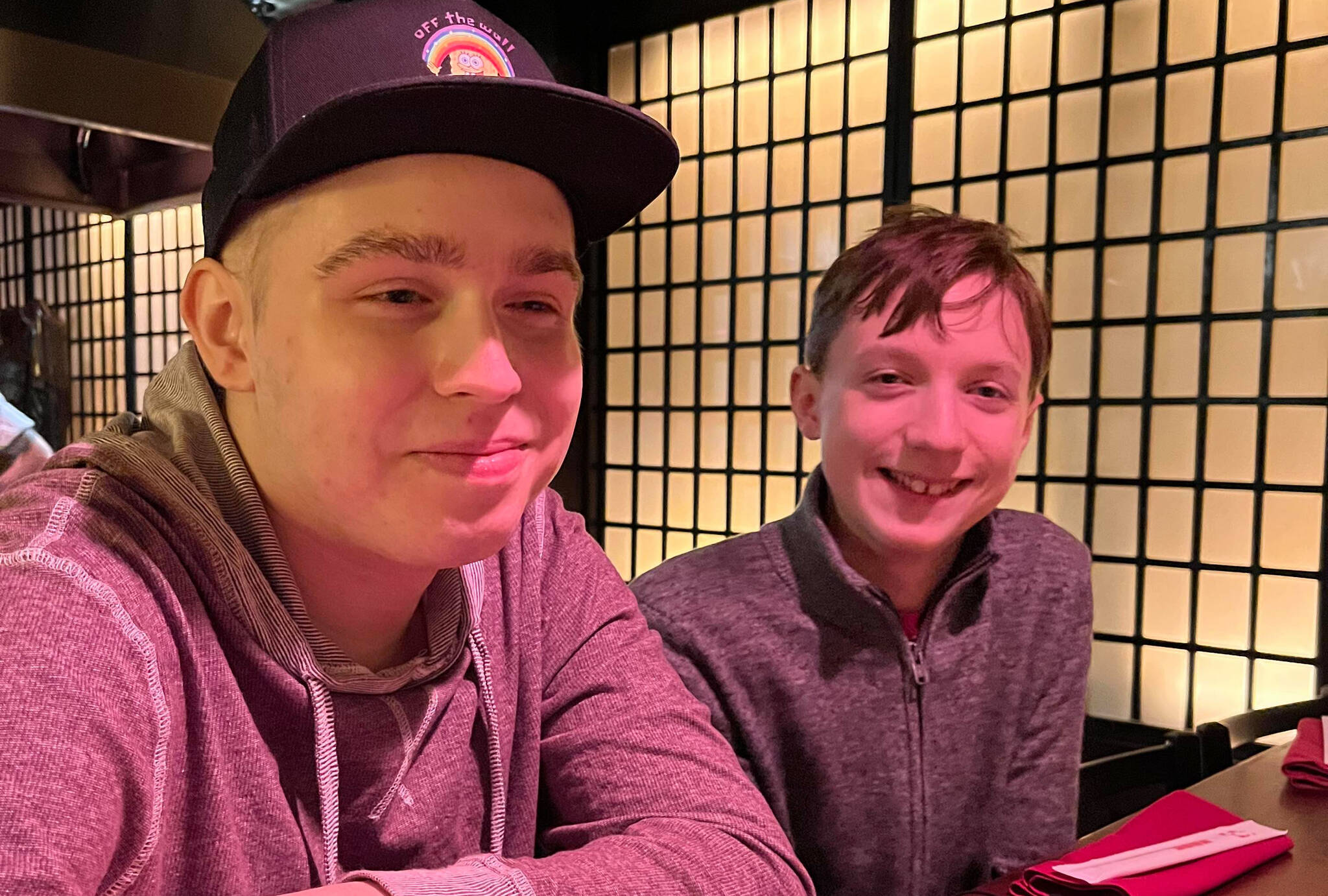 To celebrate finishing his first round of chemotherapy, Addison Johnston (left) and his younger brother Ryland were taken to a Japanese restaurant in Vancouver by parents Kristin and Shane Johnston. But lots of treatment remains for the teenager, and his family has learned some hard lessons about the healthcare system. (submitted photo)