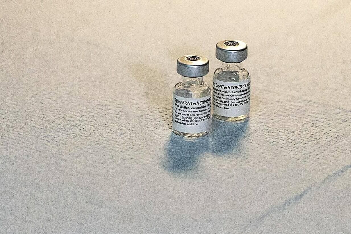 Two vials of the Pfizer-BioNTech vaccine sit on a table at a COVID-19 vaccination clinic in Halifax on Monday, May 24, 2021. THE CANADIAN PRESS/Andrew Vaughan