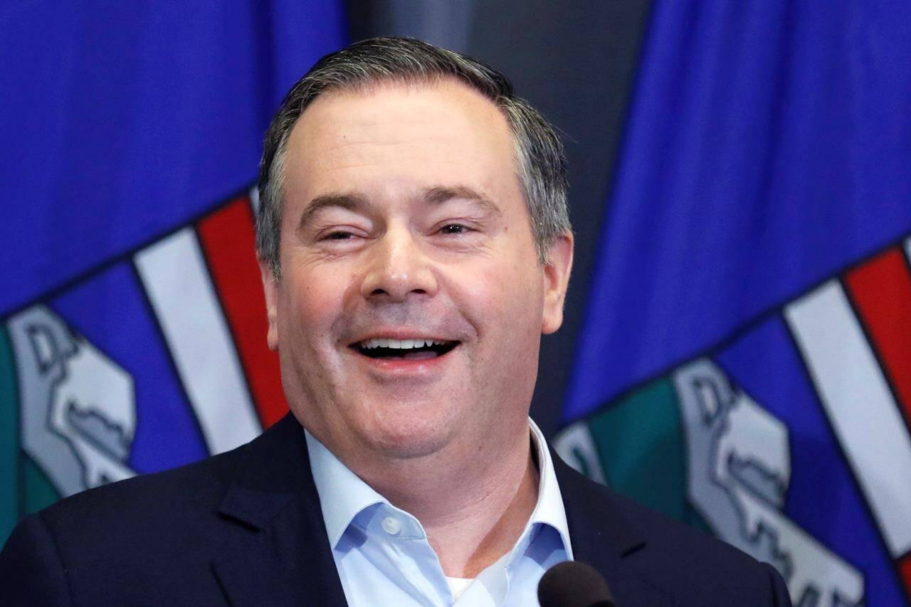 Alberta Premier Jason Kenney speaks after the United Conservative Party annual meeting in Calgary on Sunday, Nov. 21, 2021. Kenney says Alberta will begin taking online COVID-19 vaccination bookings for youngsters starting Wednesday morning. THE CANADIAN PRESS/Larry MacDougal