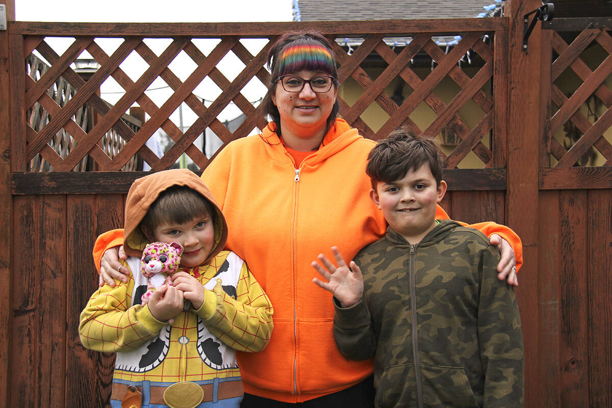 Tracey Werry fears her sons Myles, 7, and Elliott, 9, will lose their autism support in the province’s new needs-based model. (Jane Skrypnek/News Staff)