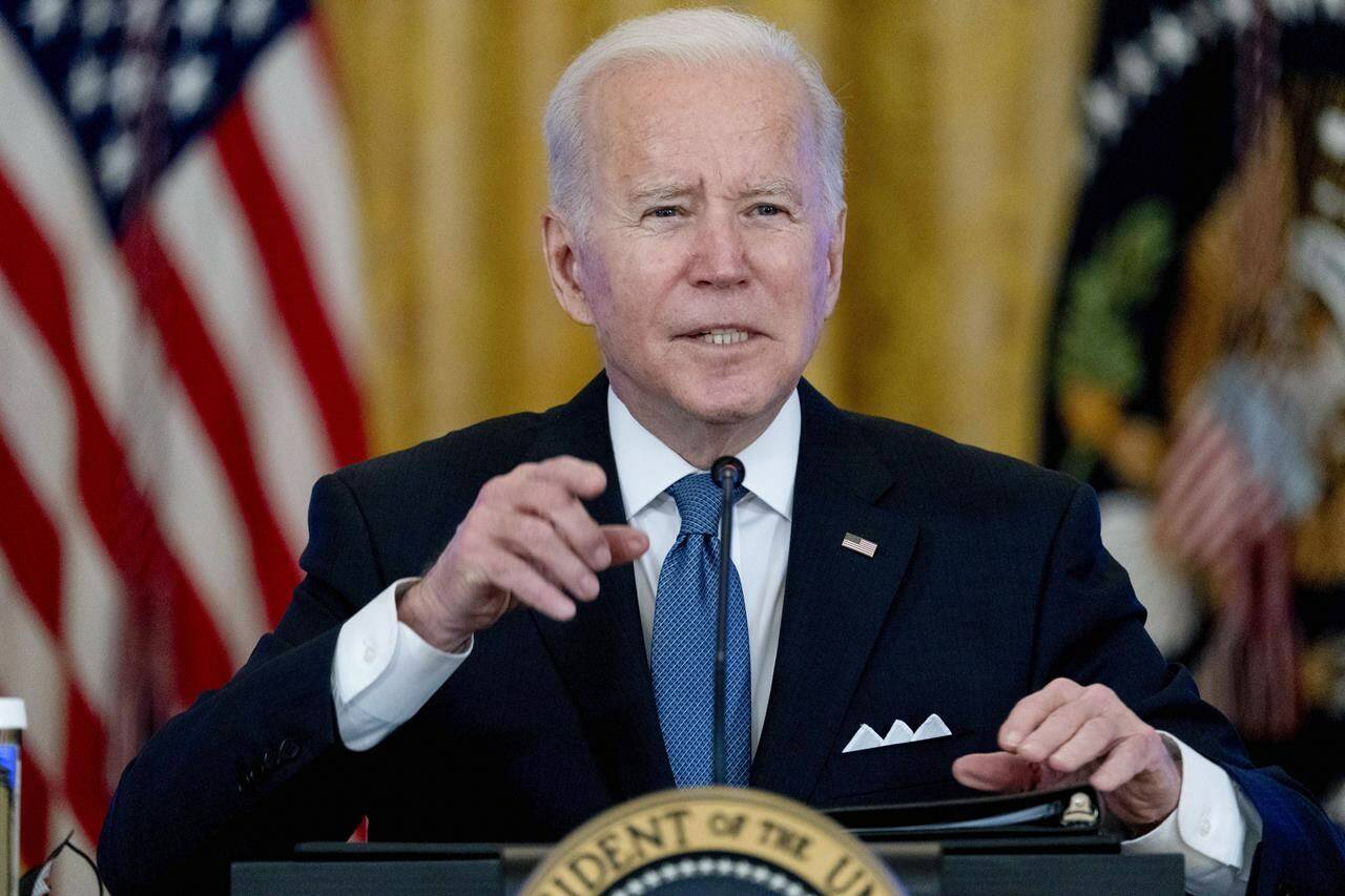 President Joe Biden responds to reporter’s questions during a meeting on efforts to lower prices for working families, in the East Room of the White House in Washington, Monday, Jan. 24, 2022. (AP Photo/Andrew Harnik)