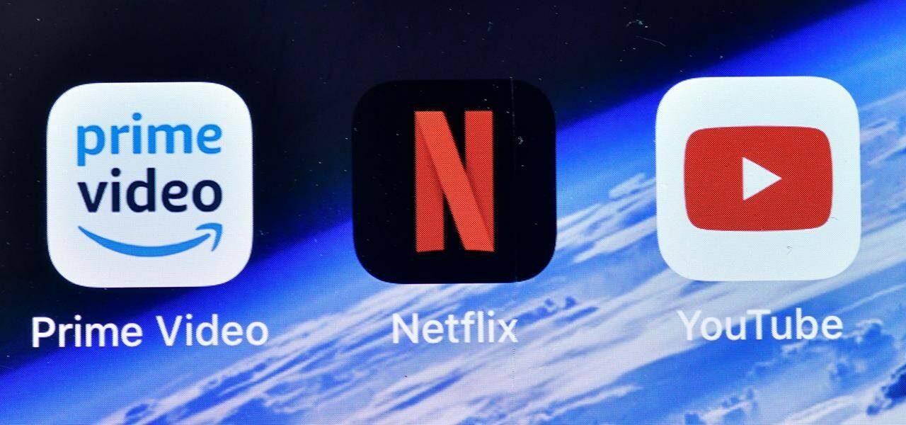 The apps of Amazon Prime Video, Netflix and YouTube are pictured on an iPhone in Gelsenkirchen, Germany, Thursday, Sept. 10, 2020. THE CANADIAN PRESS/AP/Martin Meissner