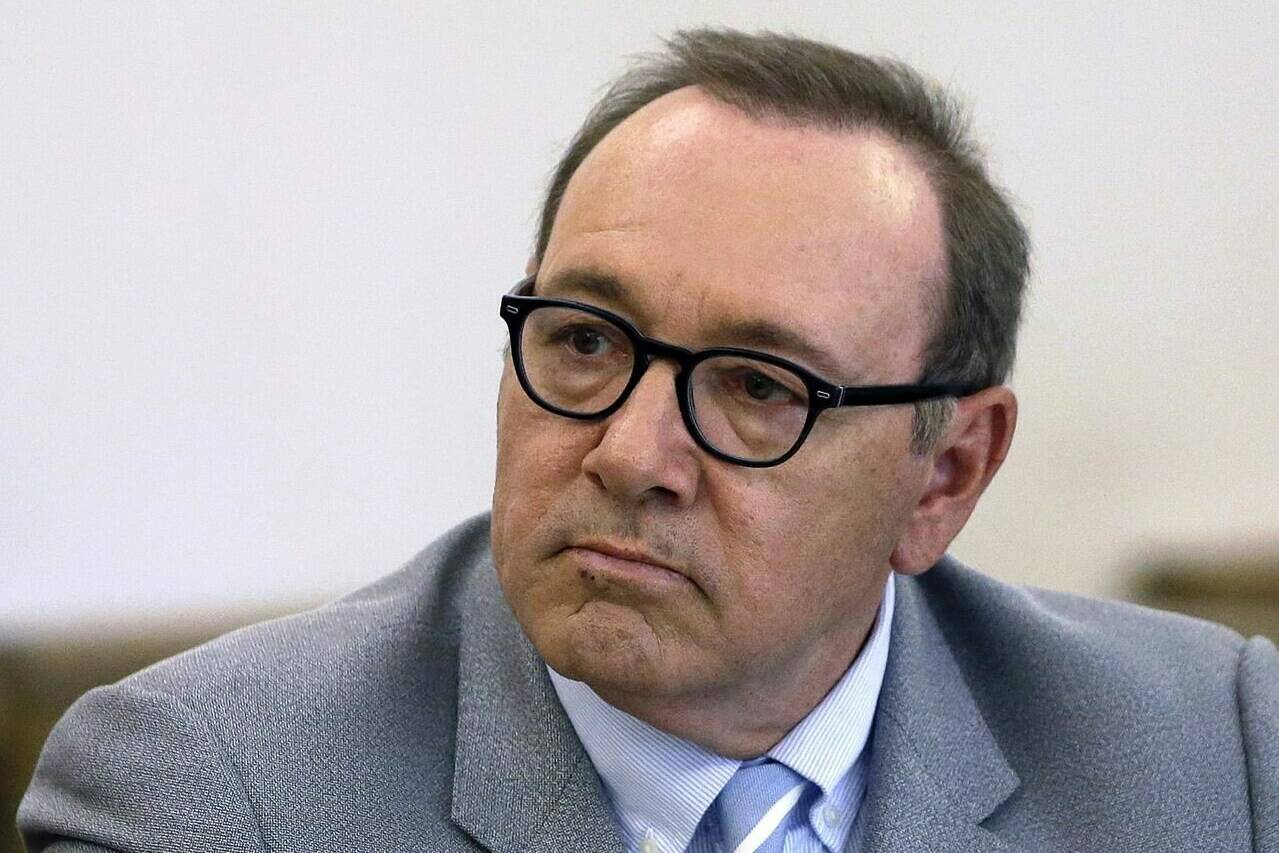 FILE - Kevin Spacey attends a pretrial hearing at district court in Nantucket, Mass, June 3, 2019. British prosecutors have charged actor Kevin Spacey with four counts of sexual assault against three men. The Crown Prosecution Service said Thursday, May 26, 2022 that Spacey “has also been charged with causing a person to engage in penetrative sexual activity without consent.” (AP Photo/Steven Senne, File)