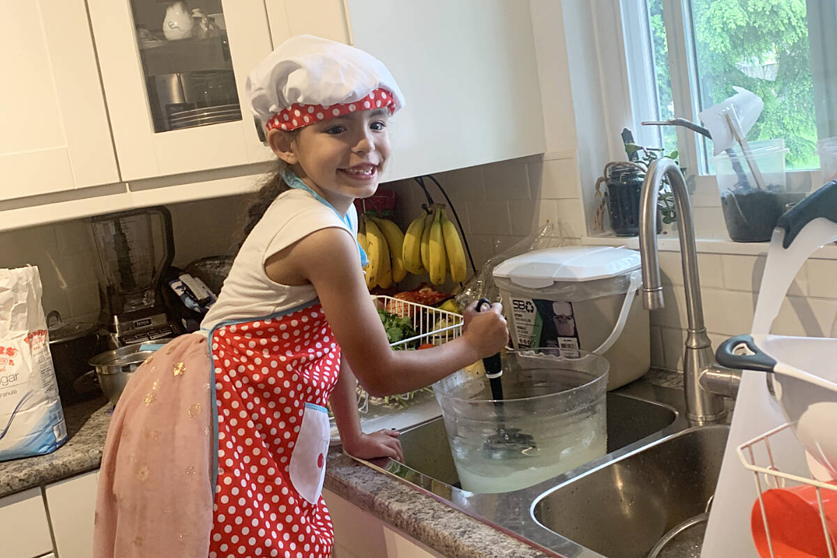 Elizabeth Denes Luque, 6, makes her lemonade from scratch. (Special to The News)