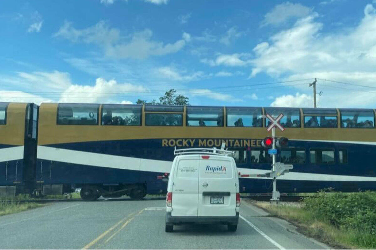 A Rocky Mountaineer train stopped at the rail crossing at Prest Road in Chilliwack on July 7, 2022 after an incident with a woman on the tracks. (Tischa photo)