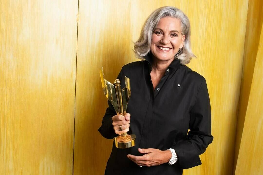 Lisa LaFlamme poses with her Canadian Screen Award for Best News Anchor, National in Toronto Wednesday, Aug. 17, 2022. The parent company of CTV News says it will launch an internal workplace review amid criticism of its dismissal of LaFlamme from her role as chief anchor. THE CANADIAN PRESS/HO-George Pimentel *MANDATORY CREDIT*