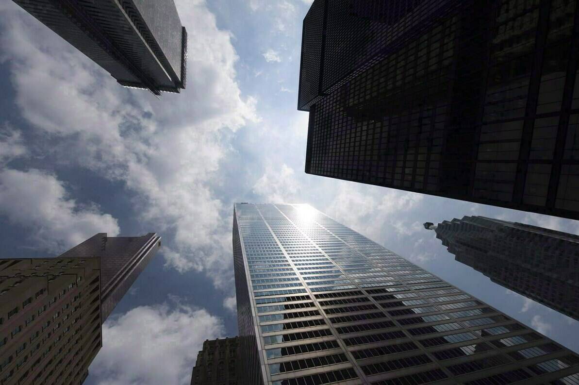 Bank towers are shown from Bay Street in Toronto's financial district, on Wednesday, June 16, 2010. Top Canadian corporations paid $30 billion less in taxes in 2021 than would be expected, according to a new report from Canadians for Tax Fairness. THE CANADIAN PRESS/Adrien Veczan