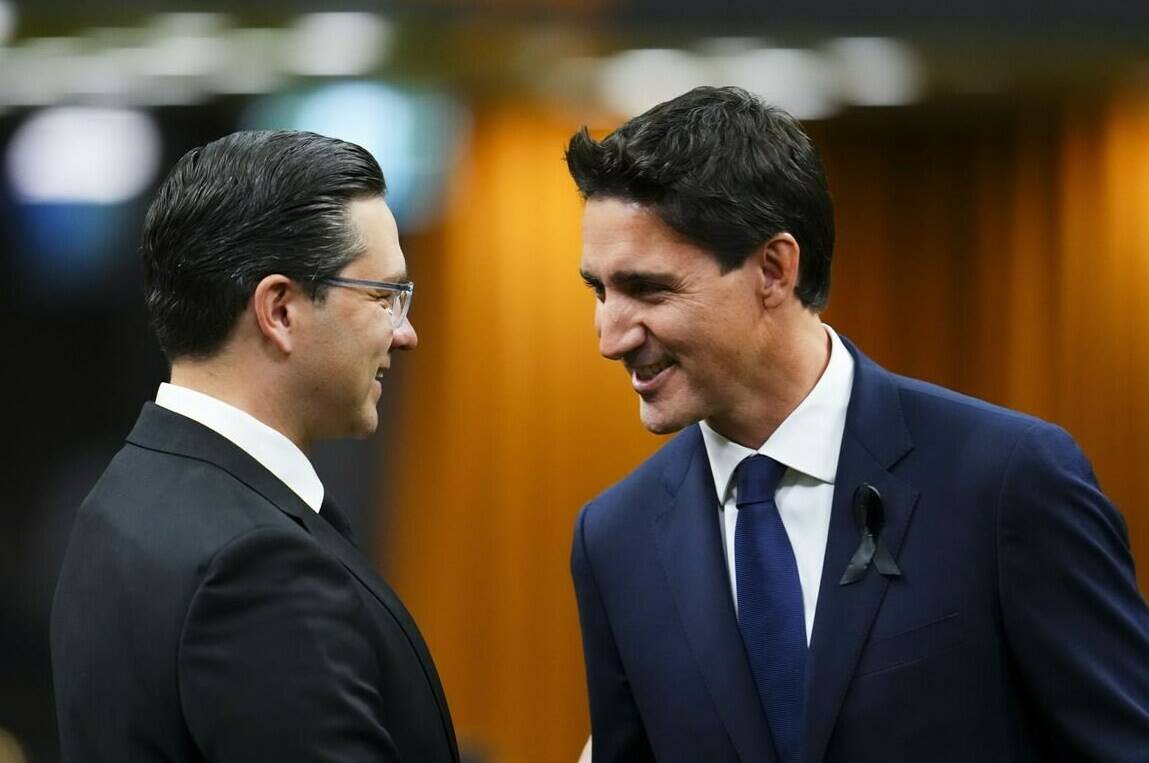 Prime Minister Justin Trudeau and Conservative Leader Pierre Poilievre greet each other as they gather in the House of Commons on Parliament Hill in Ottawa on Thursday, Sept. 15, 2022. A new poll suggest Trudeau’s Liberals have gained several points in support this month, after the Conservatives enjoyed a surge when Pierre Poilievre became leader.THE CANADIAN PRESS/Sean Kilpatrick