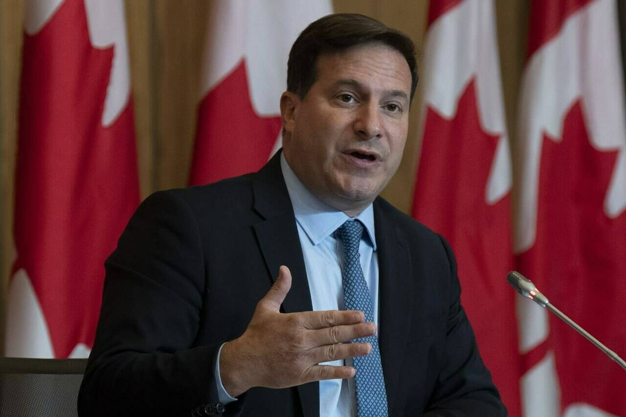 Marco Mendicino speaks during a news conference in Ottawa, Monday, Sept. 26, 2022. Mendicino visited on Monday families of victims who died during a mass stabbing, then signed an agreement to explore new ways to improve safety on some First Nations in Saskatchewan. THE CANADIAN PRESS/Adrian Wyld