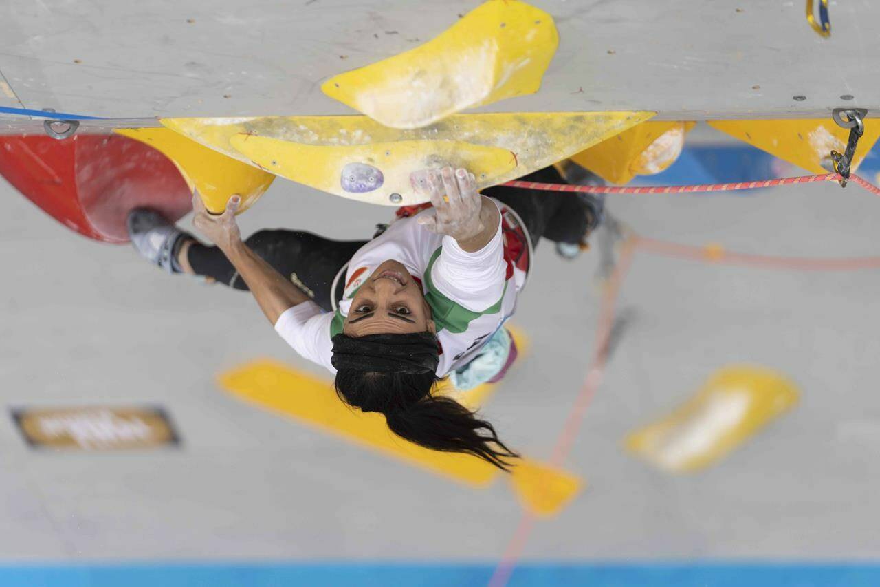 Iranian athlete Elnaz Rekabi competes during the women’s Boulder & Lead final during the IFSC Climbing Asian Championships, in Seoul, Sunday, Oct. 16, 2022. Rekabi left South Korea on Tuesday, Oct. 18, 2022 after competing at an event in which she climbed without her nation’s mandatory headscarf covering, authorities said. Farsi-language media outside of Iran warned she may have been forced to leave early by Iranian officials and could face arrest back home, which Tehran quickly denied. (Rhea Khang/International Federation of Sport Climbing via AP)