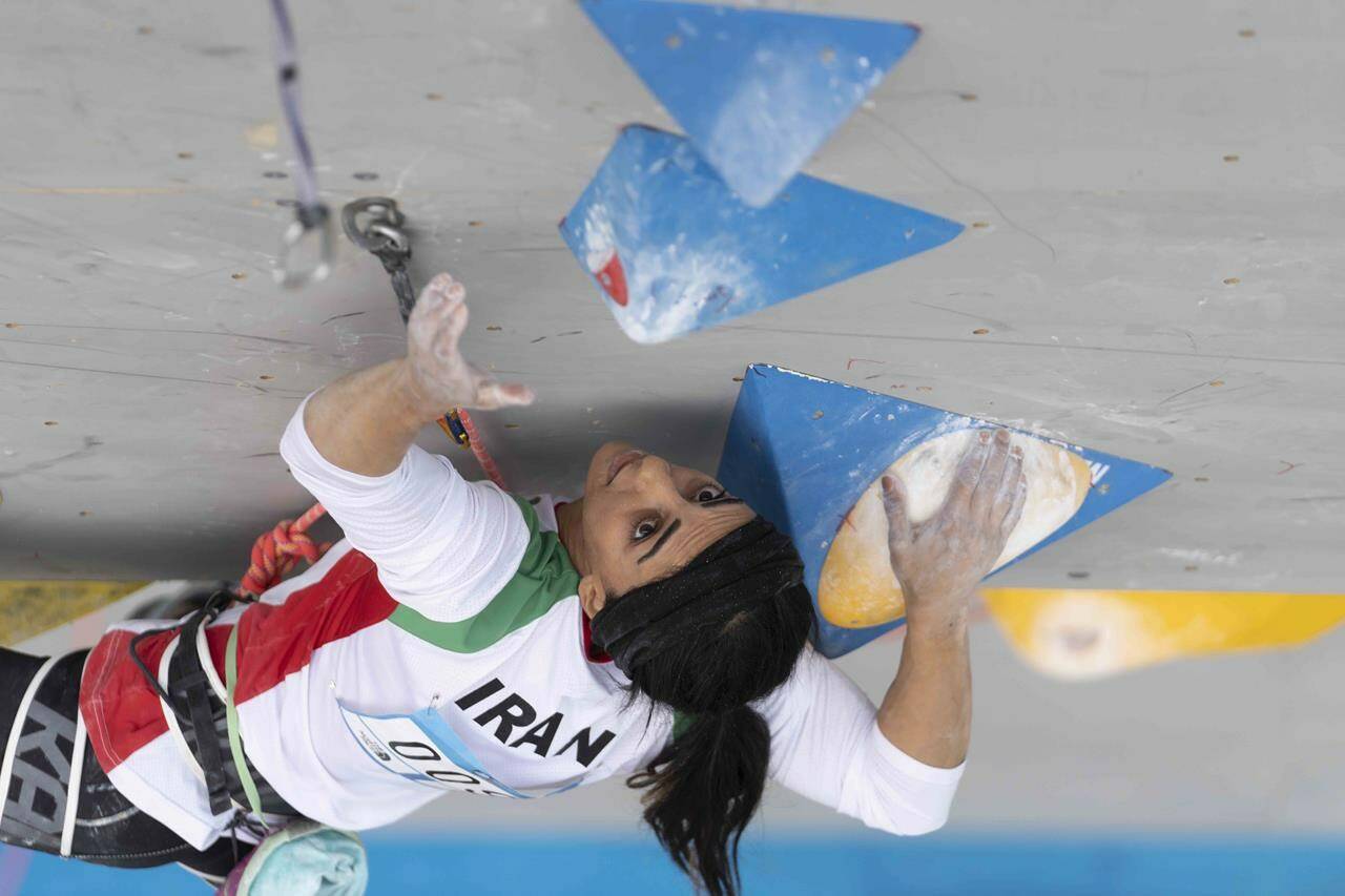 Iranian athlete Elnaz Rekabi competes during the women’s Boulder & Lead final during the IFSC Climbing Asian Championships in Seoul, Sunday, Oct. 16, 2022. Rekabi left South Korea on Tuesday, Oct. 18, 2022 after competing at an event in which she climbed without her nation’s mandatory headscarf covering, authorities said. Farsi-language media outside of Iran warned she may have been forced to leave early by Iranian officials and could face arrest back home, which Tehran quickly denied. (Rhea Khang/International Federation of Sport Climbing via AP)