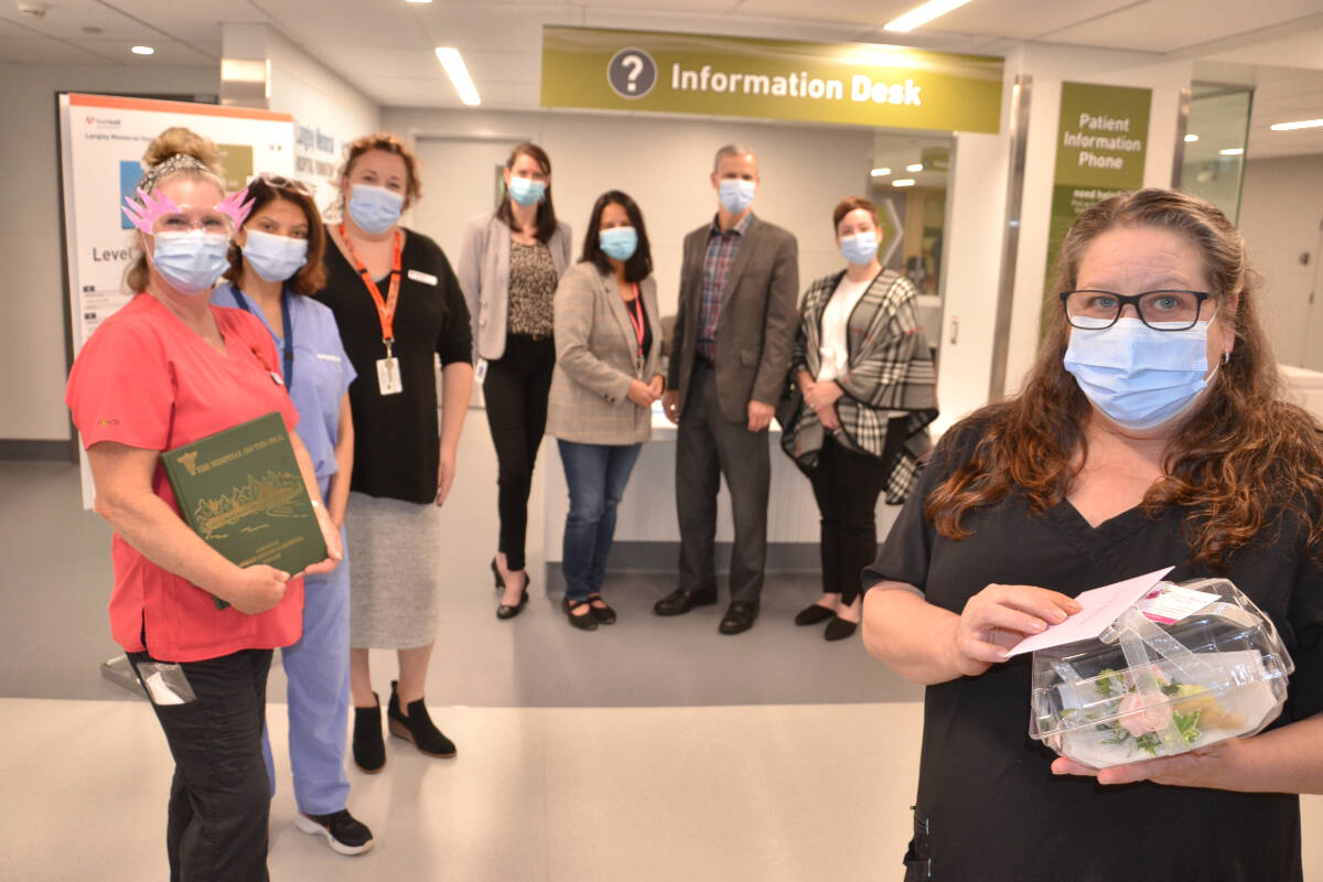 Hospital employee Shannon Bower (left) is hoping to give a special gift to Sir Elton John at his concert Friday evening. Her co-workers Berni Russell, who made Elton-style safety glasses, Kavita Dabla and manager Janine Lapierre, along with hospital foundation staff Terra Scheer, Andrea Woo, Tim Staunton, and Gabriella Matute are backing her ambitious goal. (Heather Colpitts/Langley Advance Times)