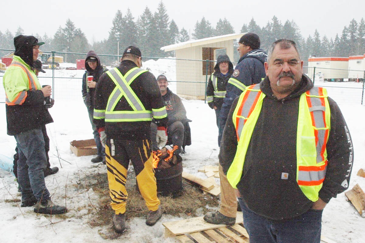 Jon Coleman (right) and other members of the Cowichan Tribes-owned Khowutzun Development Corporation are blocking work at the site of the new Cowichan District Hospital on Bell McKinnon Road over union issues. (Robert Barron/Citizen)