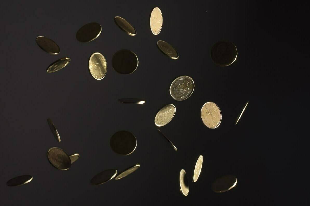 Falling Canadian dollar coins are pictured in North Vancouver, B.C. Wednesday, May 29, 2019. THE CANADIAN PRESS/Jonathan Hayward