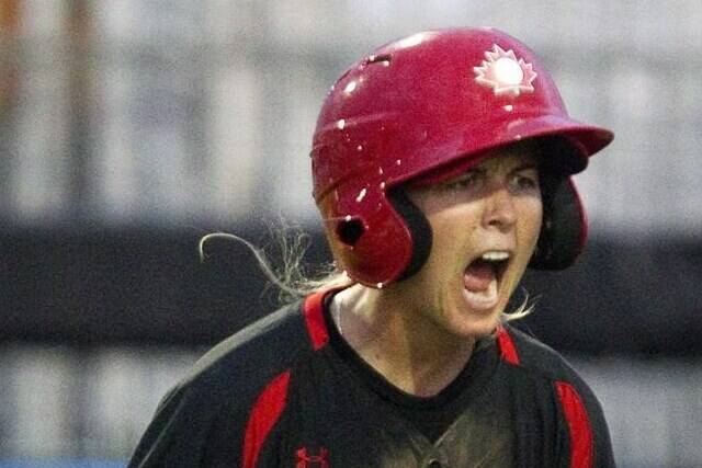 Canada’s Ashley Stephenson reacts after scoring during fifth inning women’s baseball action against Venezuela at the Pan American Games in Toronto on Saturday July 25, 2015. Stephenson, a long-time player and coach with Canada’s women’s baseball team, is joining the Toronto Blue Jays’ organization as a coach with the Vancouver Canadians. THE CANADIAN PRESS/Fred Thornhill