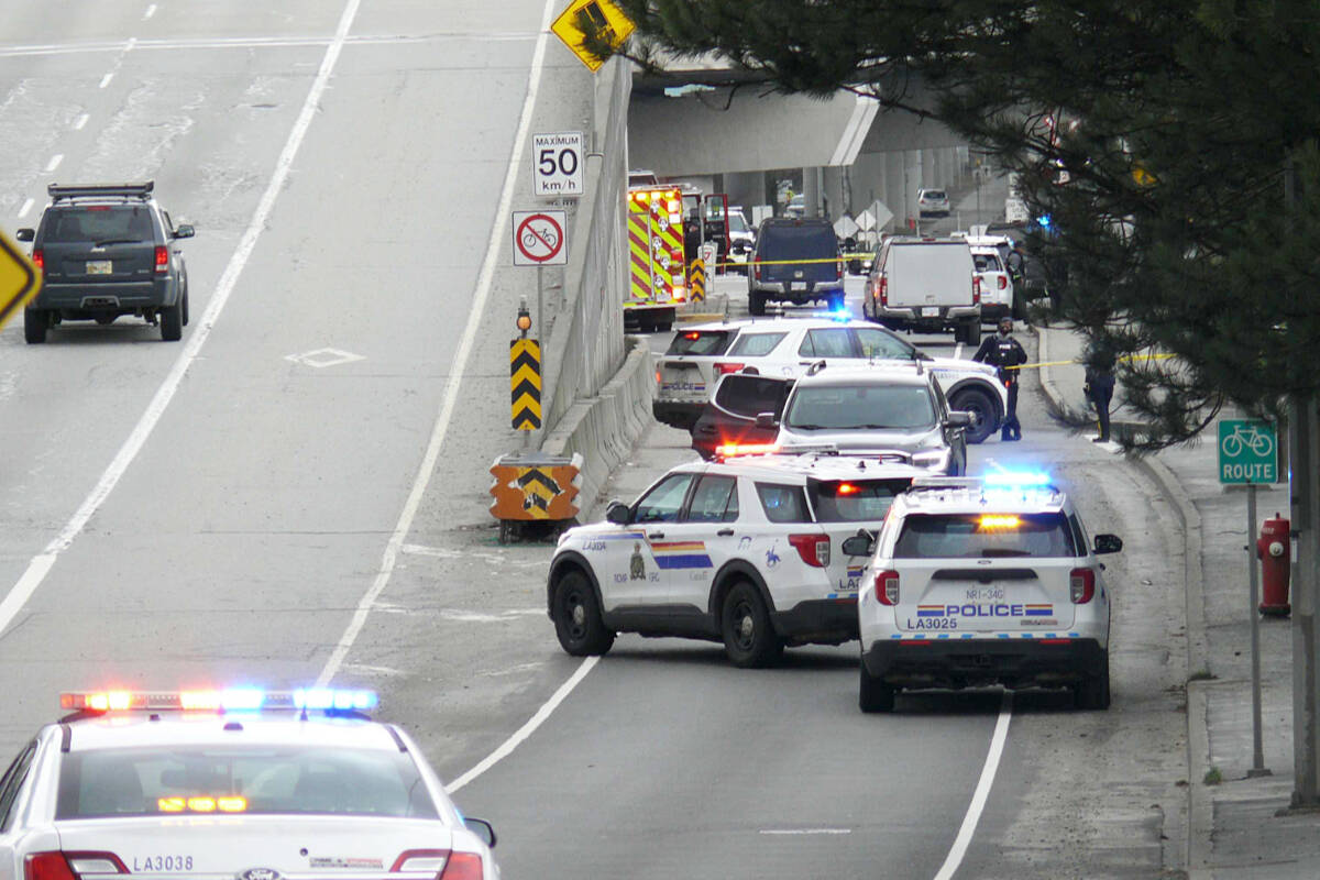 At least eight Langley RCMP vehicles were in the area of 201st Street and 96th Avenue early in the afternoon Wednesday, Feb. 8. (Dan Ferguson/Langley Advance Times)