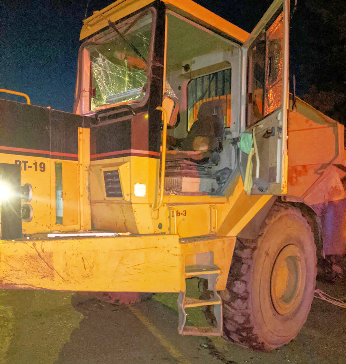 Police ended up firing shots when a suspect driving this rock truck allegedly tried to ram their police vehicle. (Facebook photo)