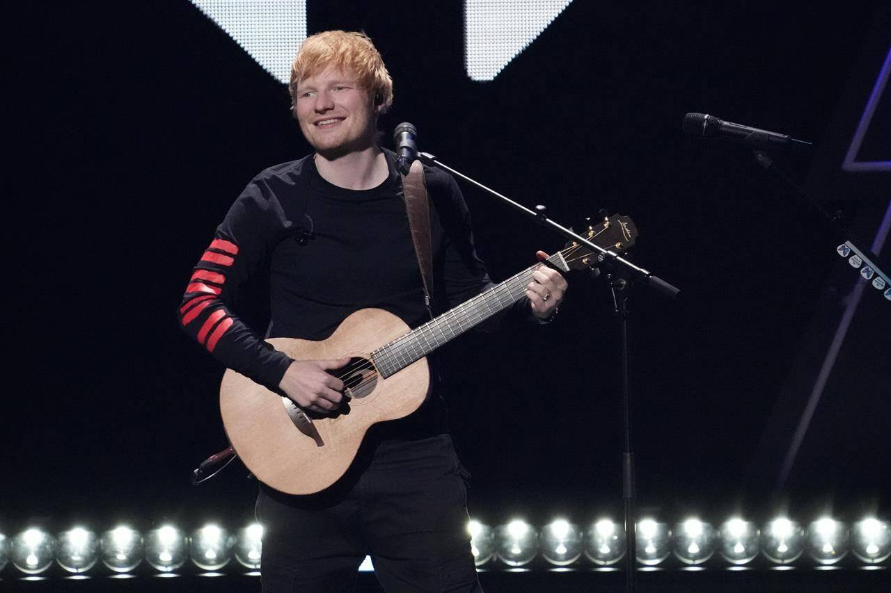 FILE - Ed Sheeran performs at Z100’s iHeartRadio Jingle Ball on Dec. 10, 2021, in New York. Jury selection and opening statements are expected to begin Monday, April 24, 2023, in a trial that mashes up Ed Sheeran’s “Thinking Out Loud” with Marvin Gaye’s “Let’s Get It On.” (Photo by Charles Sykes/Invision/AP, File)