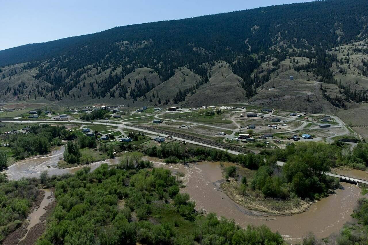 The swollen Bonaparte River runs through the Bonaparte First Nation north of Cache Creek, B.C., on Sunday, May 14, 2023. THE CANADIAN PRESS/Darryl Dyck