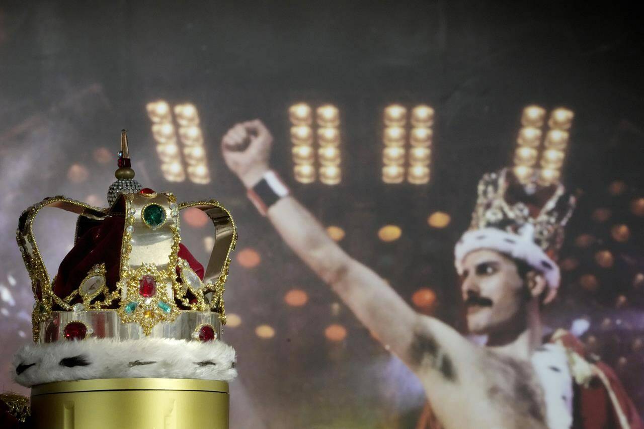 FILE - Freddie Mercury's signature crown worn throughout the 'Magic' Tour, on display at Sotheby's auction rooms in London, Thursday, Aug. 3, 2023. A Victorian-style silver snake bangle Freddie Mercury wore with an ivory satin catsuit in the “Bohemian Rhapsody” video has sold for the highest price ever paid for a piece of jewelry owned by a rock star. Sotheby's says the sale price of nearly 700,000 pounds more than doubled the amount paid for John Lennon’s leather and bead talisman in 2008. The auction includes Mercury's flamboyant stage costumes, drafts to hits such as “We are the Champions.” (AP Photo/Kirsty Wigglesworth, File)