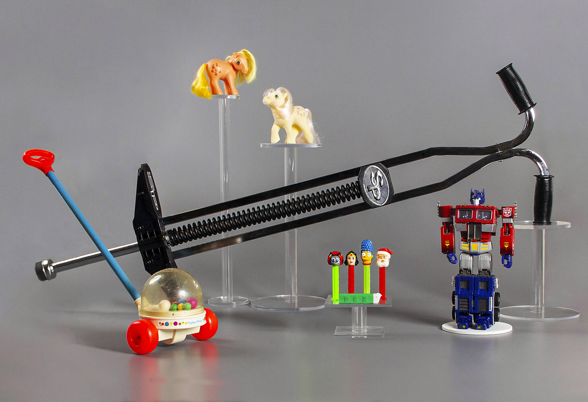 This photo provided by the National Toy Hall of Fame shows five toys that have been finalists for induction multiple times. One will be voted in by fans as the Hall of Fame celebrates its 25th anniversary. The winner, and the rest of the Class of 2023, will be announced in November. (National Toy Hall of Fame via AP)
