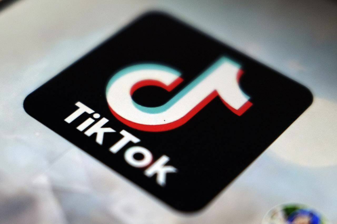 A view of the TikTok app logo, in Tokyo, Japan, Sept. 28, 2020. The European Union ratcheted up its scrutiny of Big Tech companies on Thursday, Oct. 19, 2023, with demands for Meta and TikTok to detail their efforts on curbing illegal content and disinformation amid the Israel-Hamas war. (AP Photo/Kiichiro Sato, File)